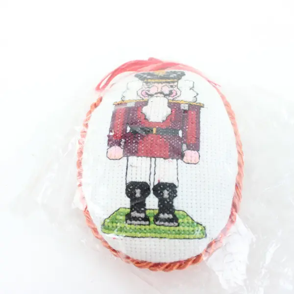 Lot of 4 Christmas Needlepoint Ornaments 2 Nutcrackers 2 Santas