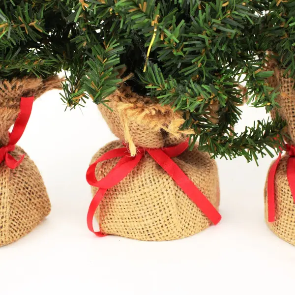 Lot of 4 Mini Artificial Christmas Trees Burlap Base Tabletop Decor