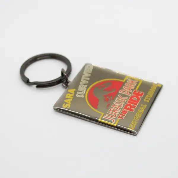 Universal Studios Jurassic Park The Ride Sarah Survived Keychain