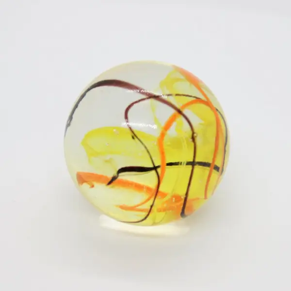 Clear Art Glass Marble 1.5 Inch Orange Yellow Swirls