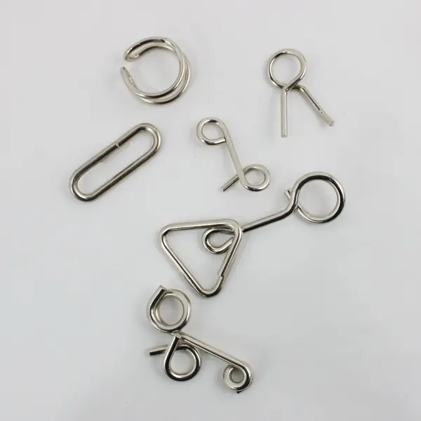 Lot of 30 Metal Wire Brain Teaser Puzzles Interlocking Disentanglement