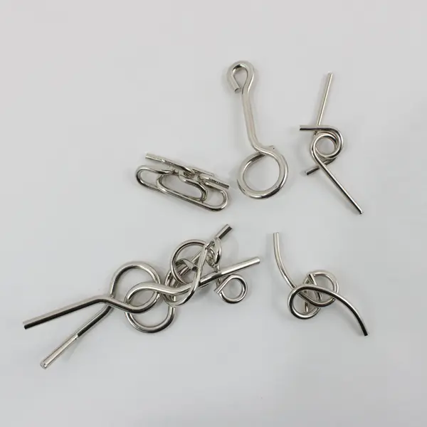 Lot of 30 Metal Wire Brain Teaser Puzzles Interlocking Disentanglement