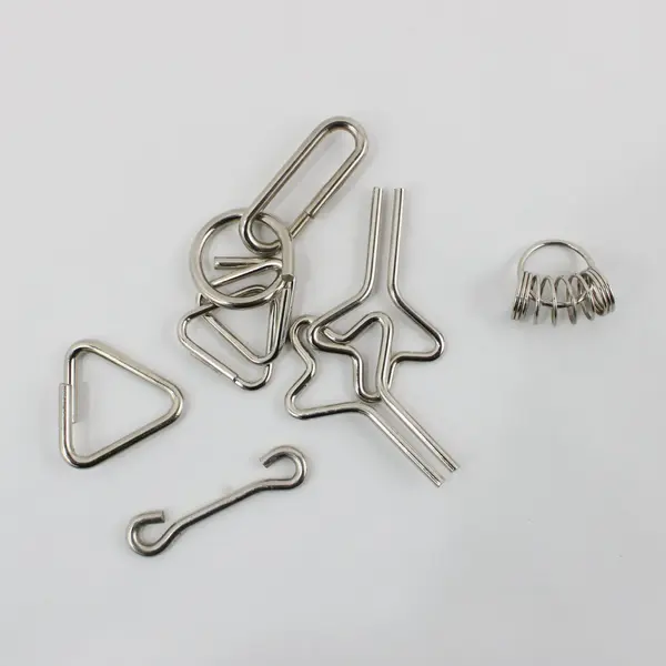 Lot of 30 Metal Wire Brain Teaser Puzzles Interlocking Disentanglement