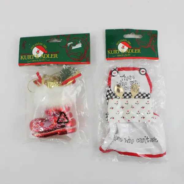 Lot 2 Kurt S. Adler Santa's World Holiday-Themed Ornaments, Boot and Apron, New 