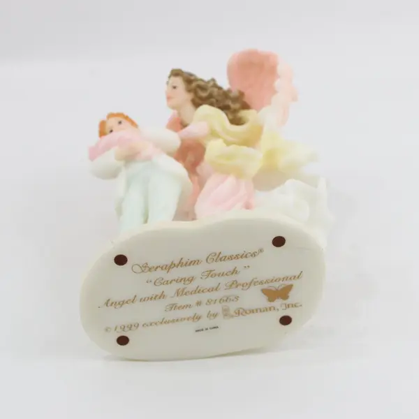 1999 Roman Seraphim Classics Caring Touch Angel Figurine 81663 