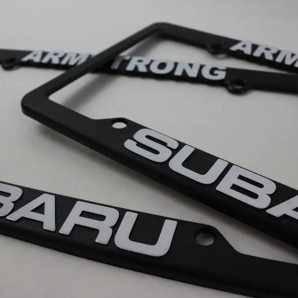 Pair Armstrong Subaru Dealer License Plate Frames Black White