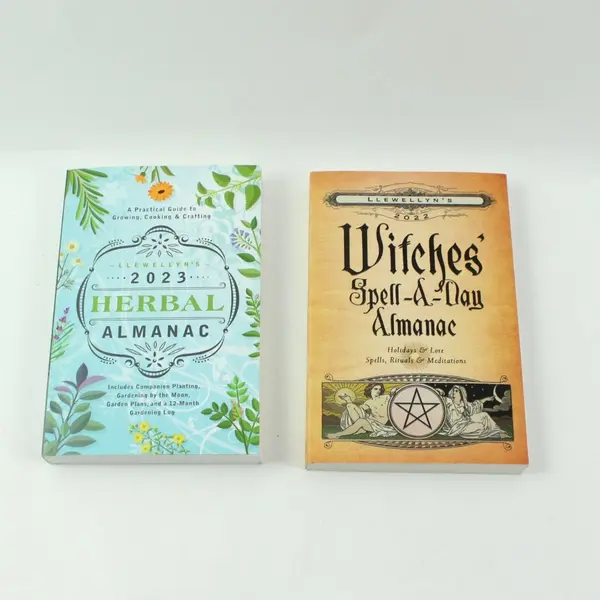 Lot of 2 Llewellyn 2022 Witches' Spell-A-Day & 2023 Herbal Almanac Books