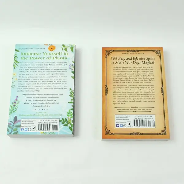 Lot of 2 Llewellyn 2022 Witches' Spell-A-Day & 2023 Herbal Almanac Books