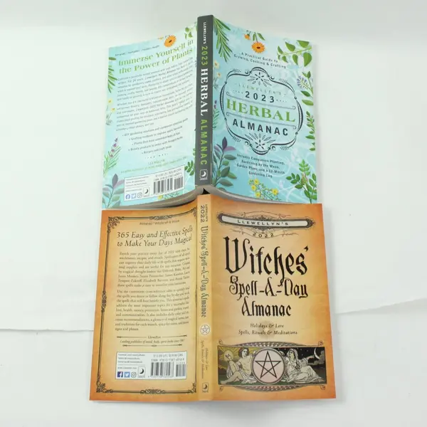 Lot of 2 Llewellyn 2022 Witches' Spell-A-Day & 2023 Herbal Almanac Books