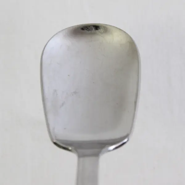 A Reed & Barton Select East Hampton Pattern Sugar Spoon Stainless 6.25 Inches