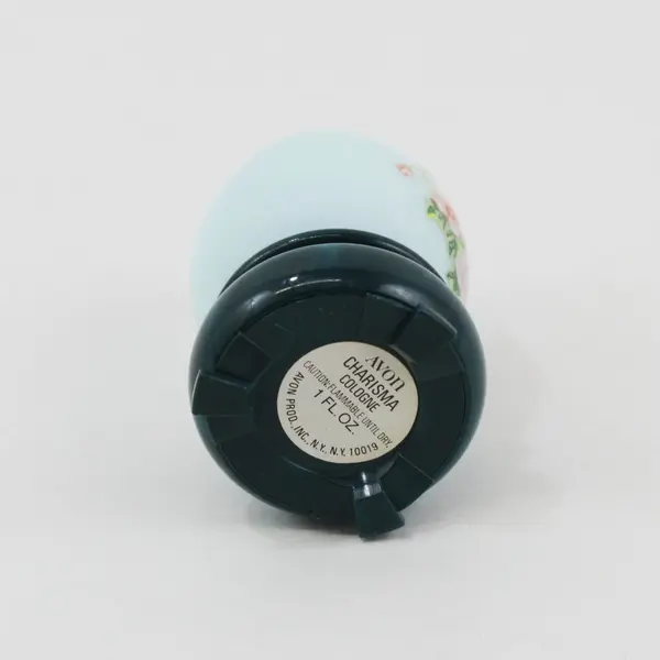 Avon Charisma 1 fl oz Cologne Egg Bottle Blue Floral Empty