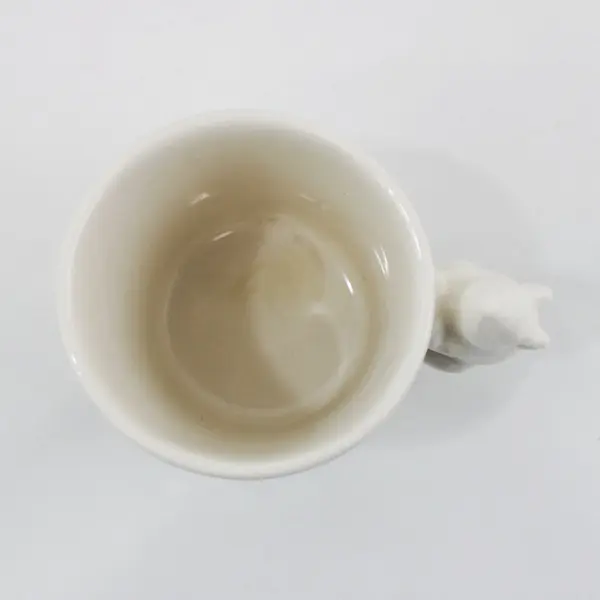 White Ceramic Coffee Mug With Figural Mouse Handle and Silver Band Around Bottom