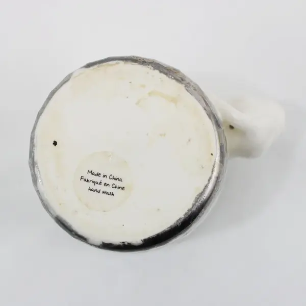 White Ceramic Coffee Mug With Figural Mouse Handle and Silver Band Around Bottom