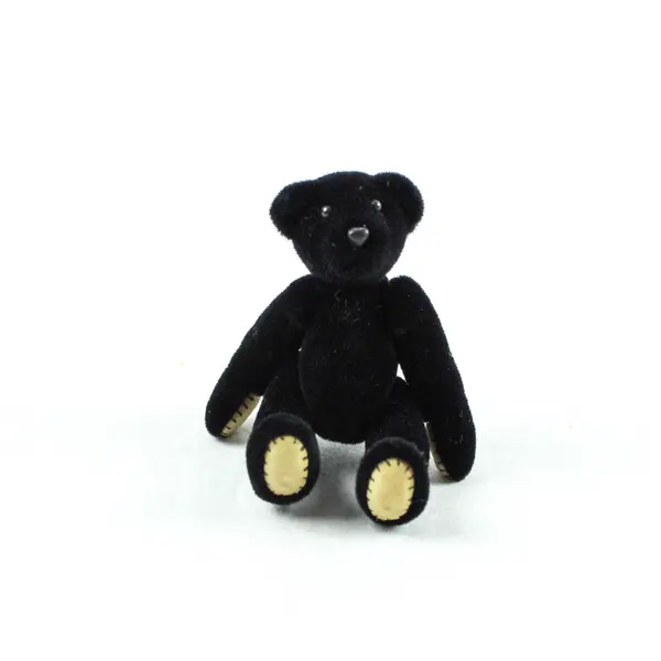 Small Black Velveteen Jointed Teddy Bear in Yellow Box