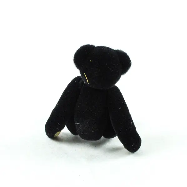 Small Black Velveteen Jointed Teddy Bear in Yellow Box