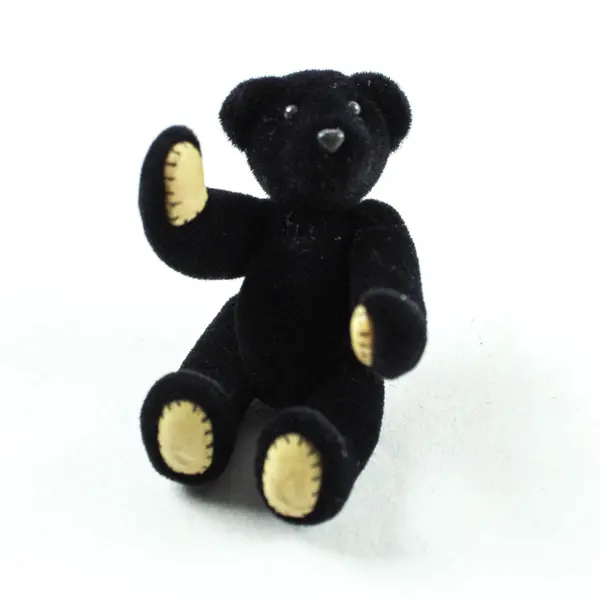 Small Black Velveteen Jointed Teddy Bear in Yellow Box