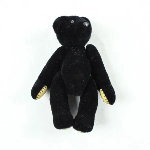Small Black Velveteen Jointed Teddy Bear in Yellow Box