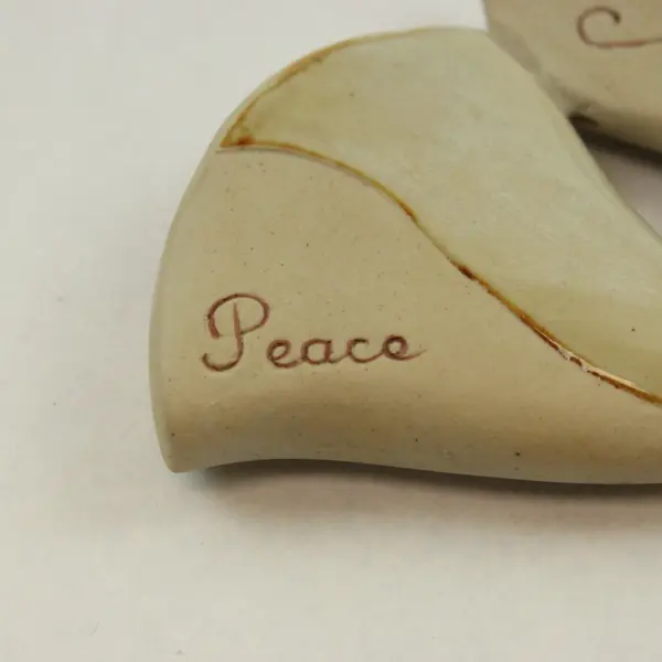 Seasons of Cannon Falls Peace Angel Stoneware Christmas Ornament
