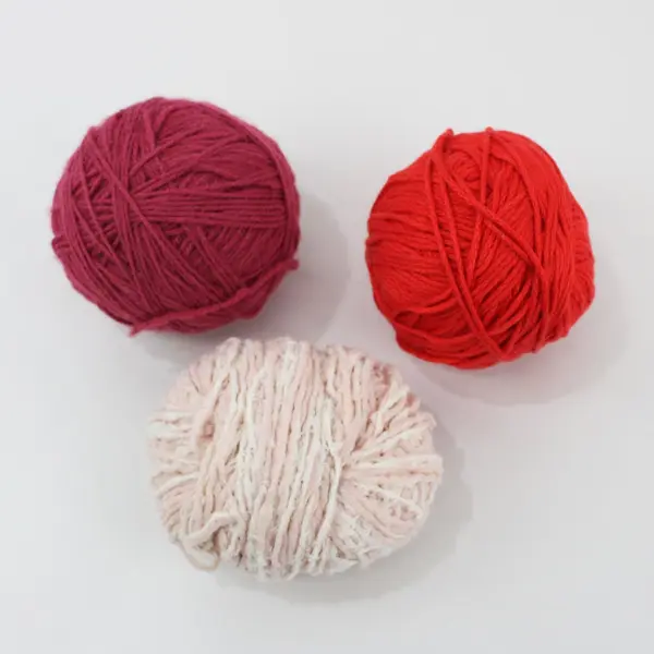 Lot of 3 Balls of Knitting Yarn: Red, Pink/White and Burgundy, pre-owned. 
