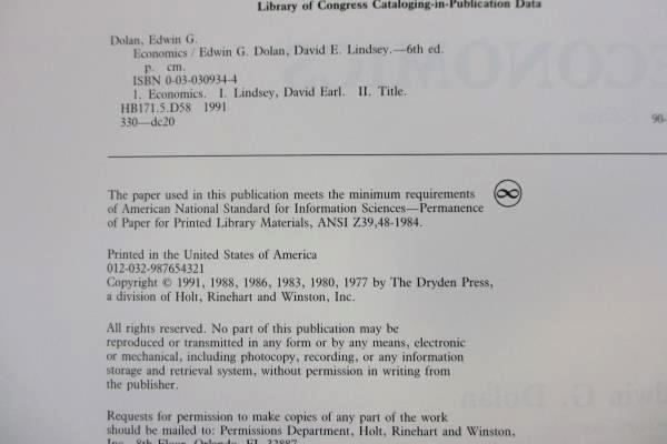 Economics by Edwin G. Dolan and David E. Lindsey 1991 Hardcover Revised Textbook